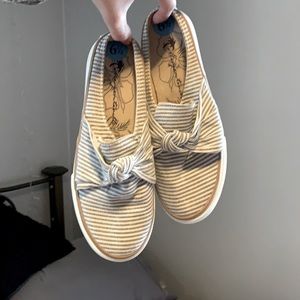 White and gray striped flats